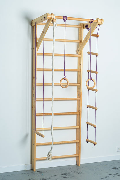 Wooden Wall stall bars with fixed pull up bar and rope items. Home exercises for kids and adults