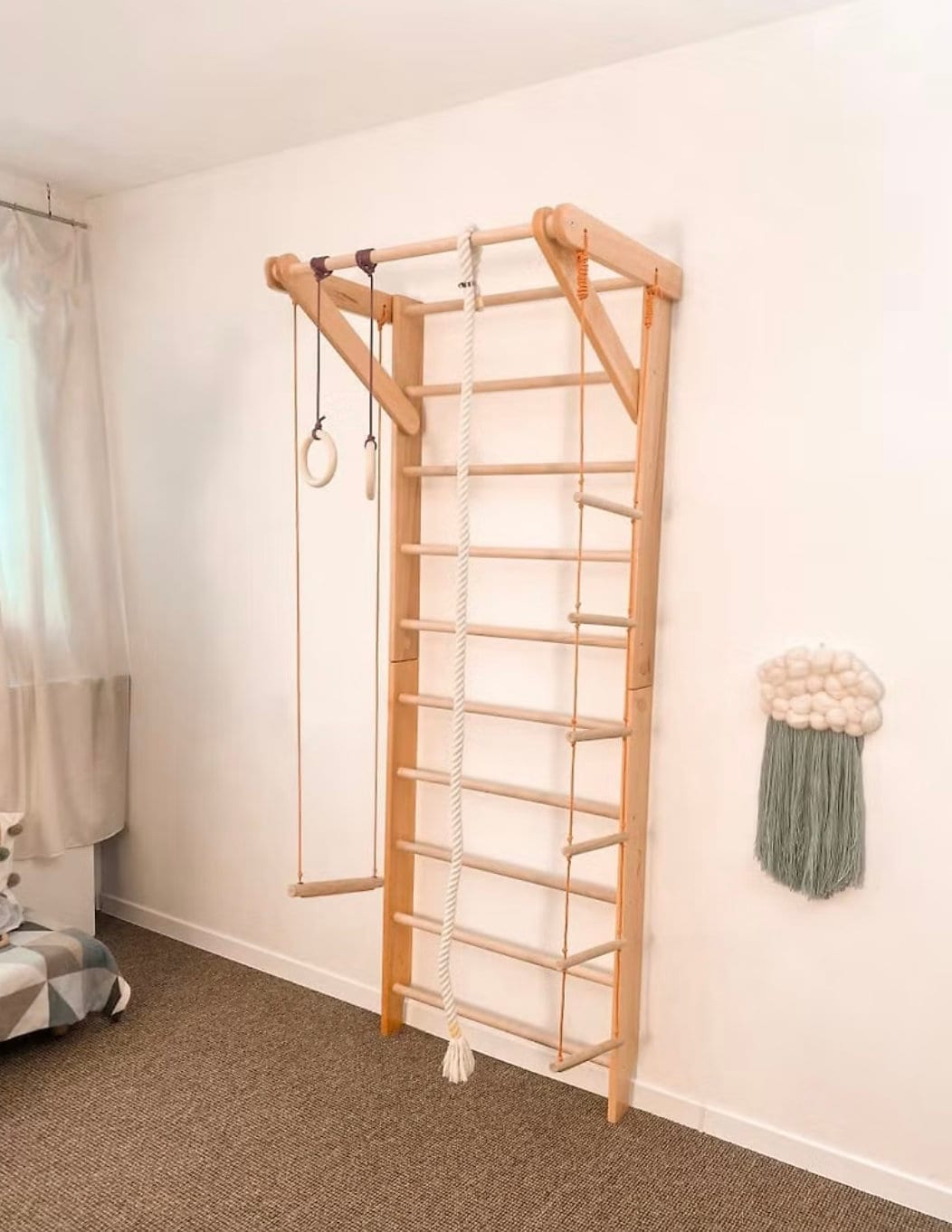 Wooden Wall stall bars with fixed pull up bar and rope items. Home exercises for kids and adults